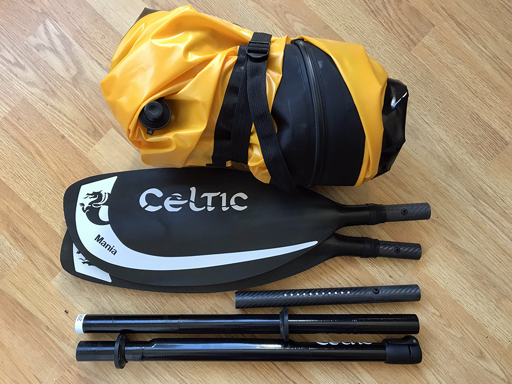 Folded packraft and dismantled paddle.