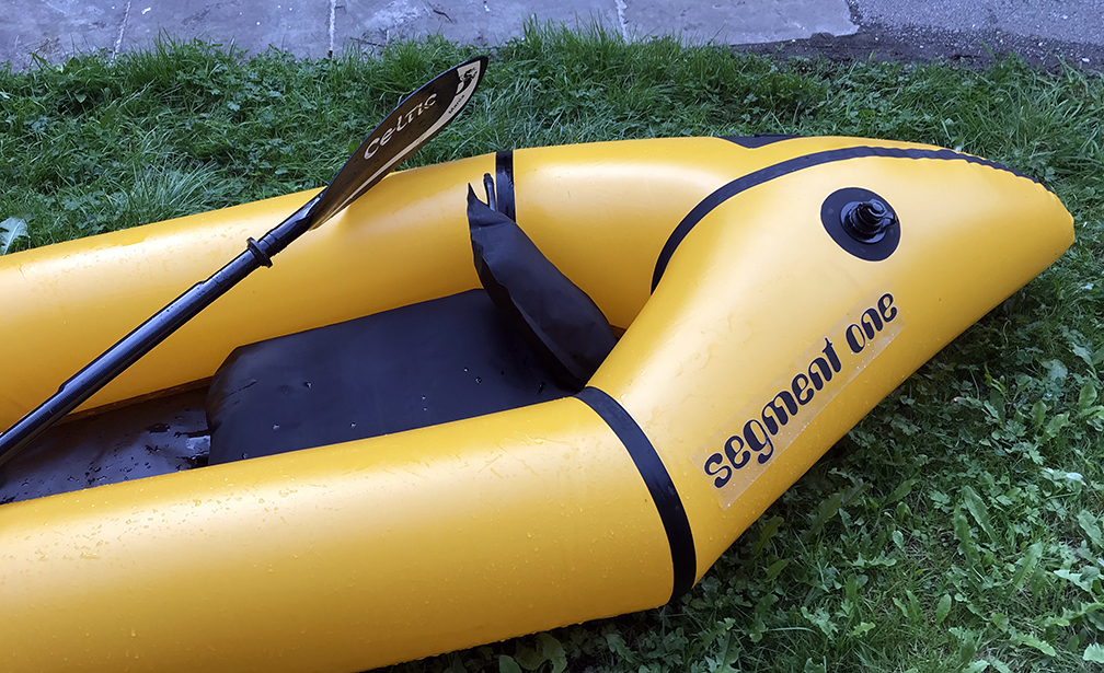 Rear half of inflated packraft showing seat