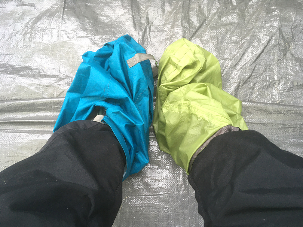 Feet in dry bags to keep warm